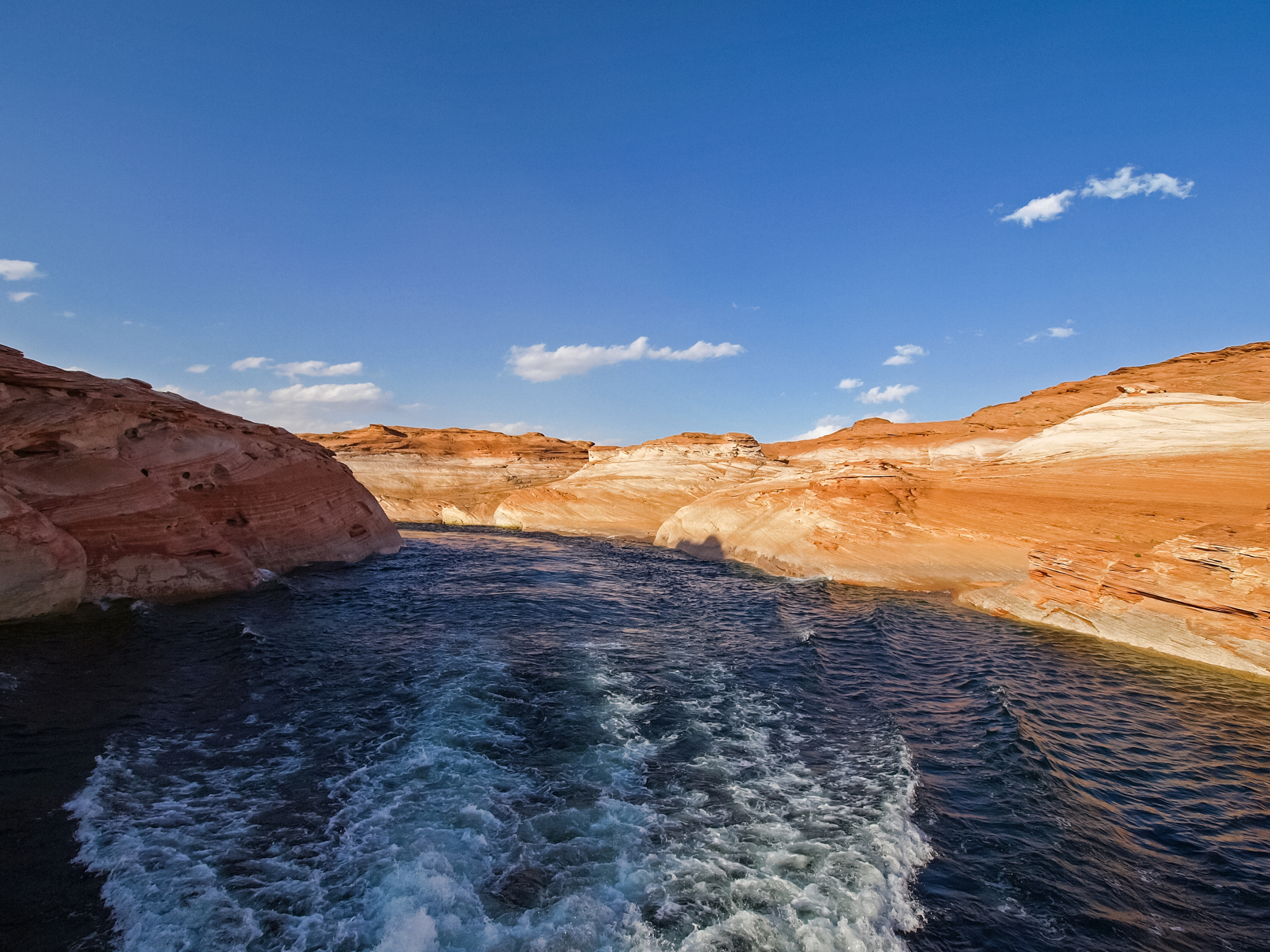 Lake Powell is based on Colorado River with a great view on the canyon. Beautiful canyon and lonely rocks on the Lake Powell, Utah.